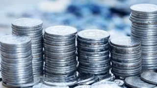 Silver Steadies Near 57 USD as Traders Weigh 6th Annual Supply Deficit Against Rate Fears