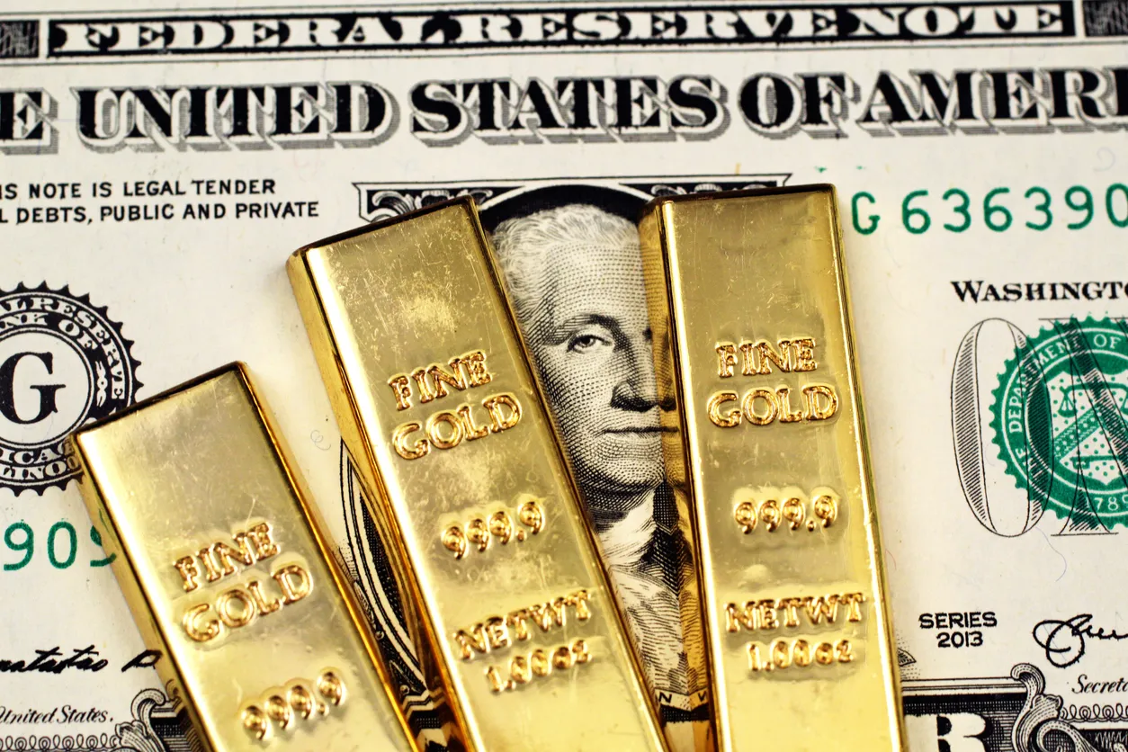 Gold Slips as Strong U.S. Data Weighs on Outlook