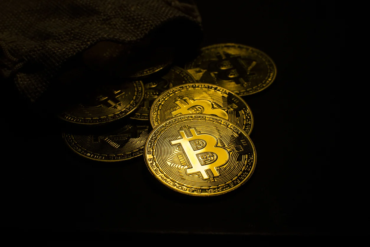 Bitcoin Falls to $65K as Strategy Sale and Iran Risks Weigh